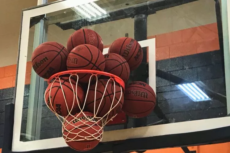Can three basketballs fit in a rim